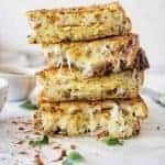 Cheese and Onion Sandwich stack with cheese oozying out