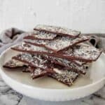 Coconut Bark pieces on white plate